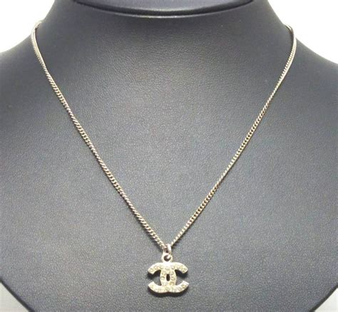 chanel dark silver tone chain and rhinestones cc logo necklace|chanel necklace price.